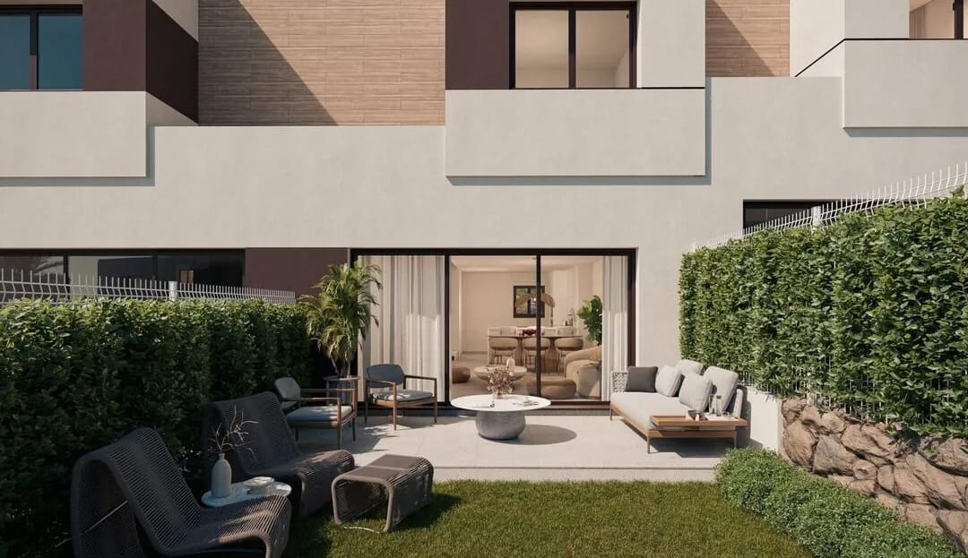 Elegant outdoor garden with lush greenery, manicured hedges, and a cream-colored square-shaped modern home in the background