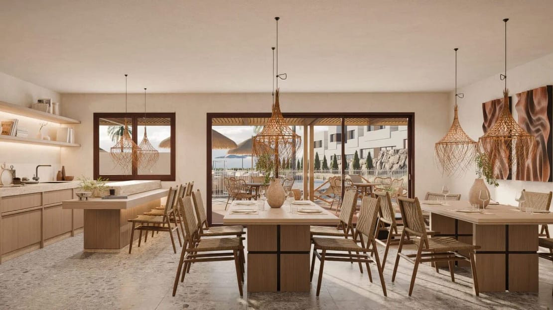 Spacious dining room with a table for 10, open kitchen layout, and outdoor view of swimming pool and palm trees