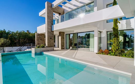 Modern beachside villa in Marbesa with private pool and garden