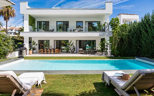 Modern luxury home Villa Gardenias with rooftop terrace, private pool, and elegant garden on the border of Puerto Banus and Nueva Andalucía.